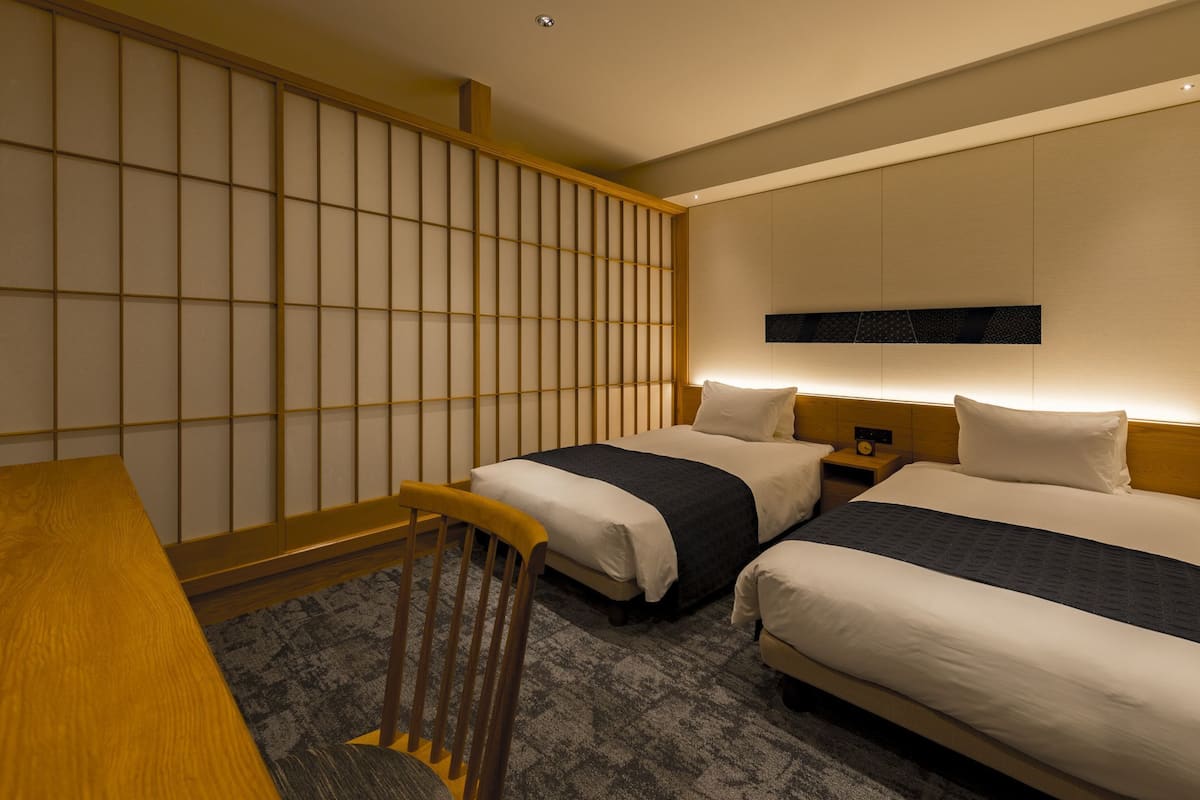 japanese-western style twin room, non smoking (with washer-dryer) | in-room safe, blackout curtains, iron/ironing board, free wifi