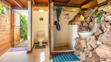 Bathtub, hair dryer, towels, soap