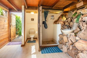 Bathtub, hair dryer, towels, soap