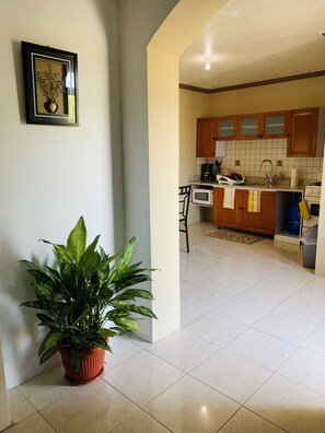 Microwave, coffee/tea maker, cookware/dishes/utensils