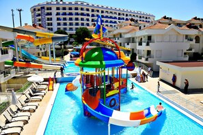 A water park with multiple slides and a pool area. - Dream Family Club (Manavgat)