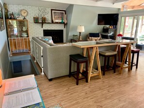 Smart TV, fireplace, DVD player, books