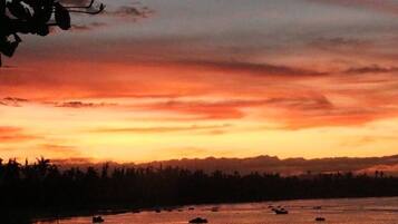 On the beach, sun-loungers, beach towels