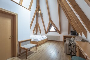 Grand eenpersoonskamer | Een kluis op de kamer, verduisterende gordijnen, geluiddichte muren