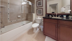 Combined shower/tub, hair dryer, towels, soap