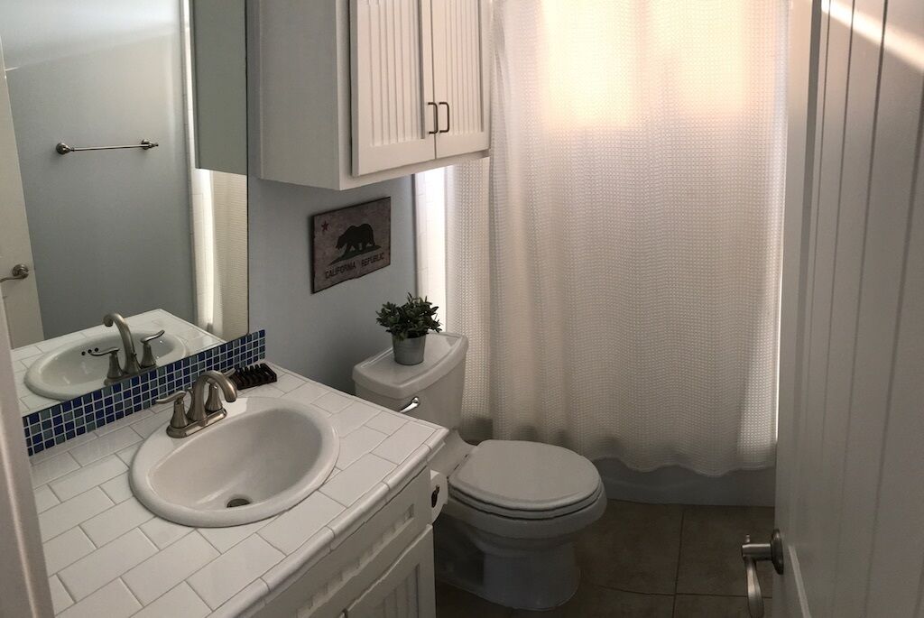 Guest bathroom with a tub.