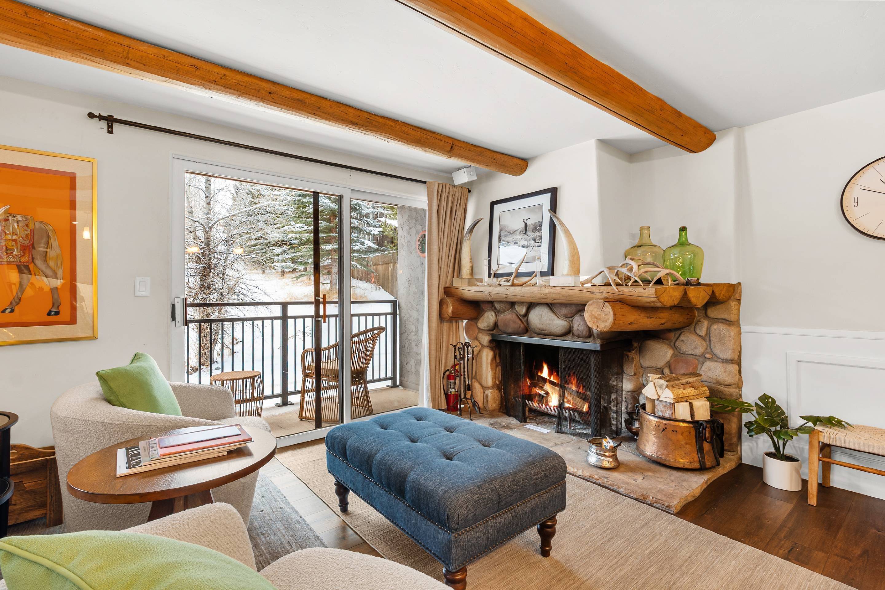 Cozy up by the fireplace after skiing or hiking in Aspen!