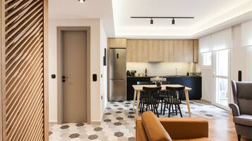 Apartment | Living area | 43-inch flat-screen TV with satellite channels, Smart TV, Netflix