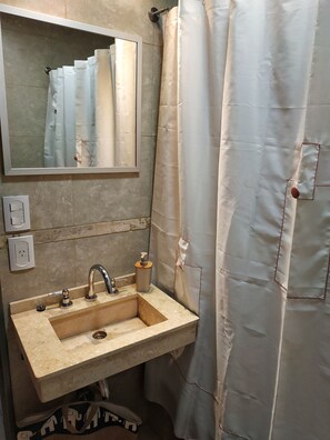 Bathtub, bidet, towels, soap