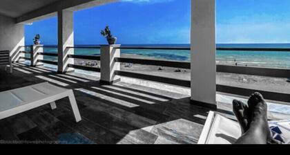 House on the beach of Punta Piccola at the Scala dei Turchi