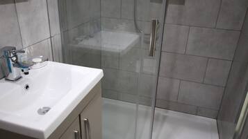 Secador de pelo, toallas