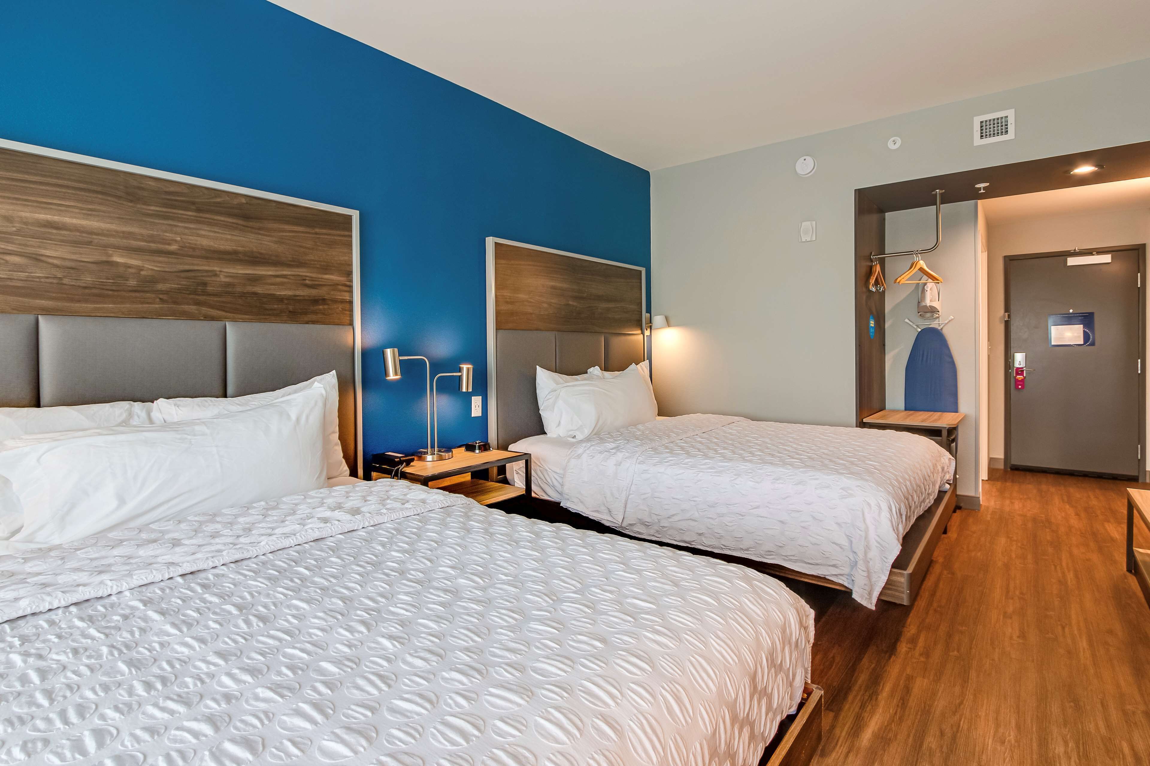 room, 2 queen beds | desk, blackout curtains, iron/ironing board, free cots/infant beds