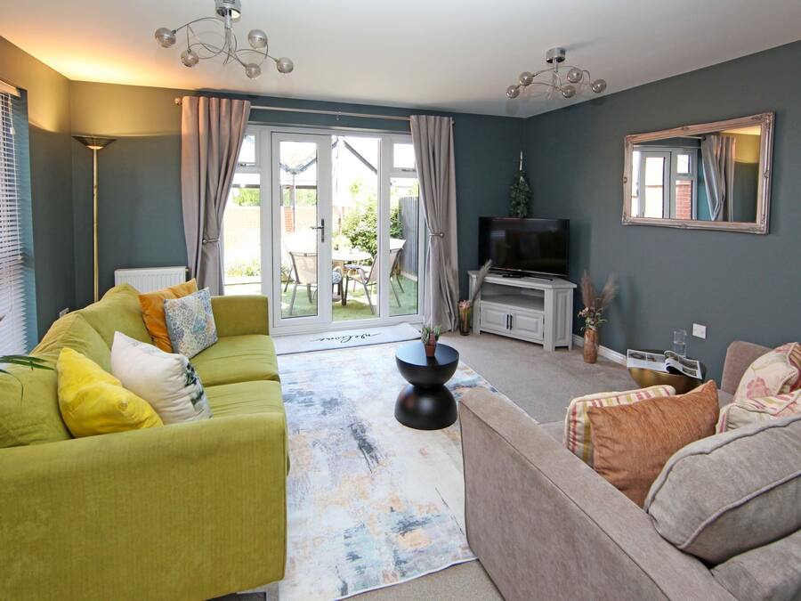 Executive House, 3 Bedrooms | Living area | Flat-screen TV