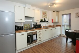 Executive Apartment, 2 Bedrooms | Private kitchen | Fridge, microwave, toaster, cookware/dishes/utensils