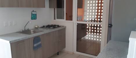 Microwave, coffee/tea maker, cookware/dishes/utensils, spices