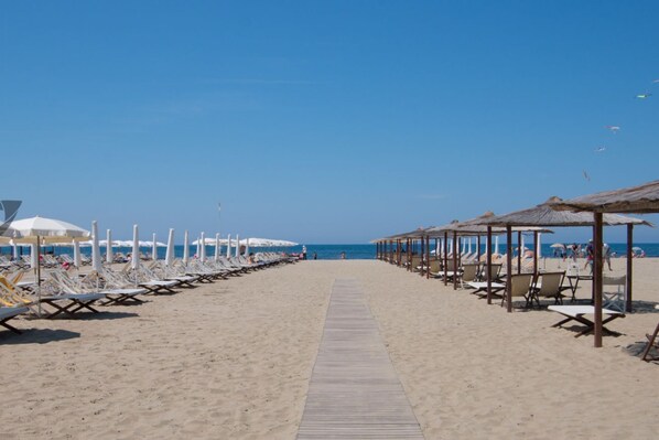 On the beach, beach towels