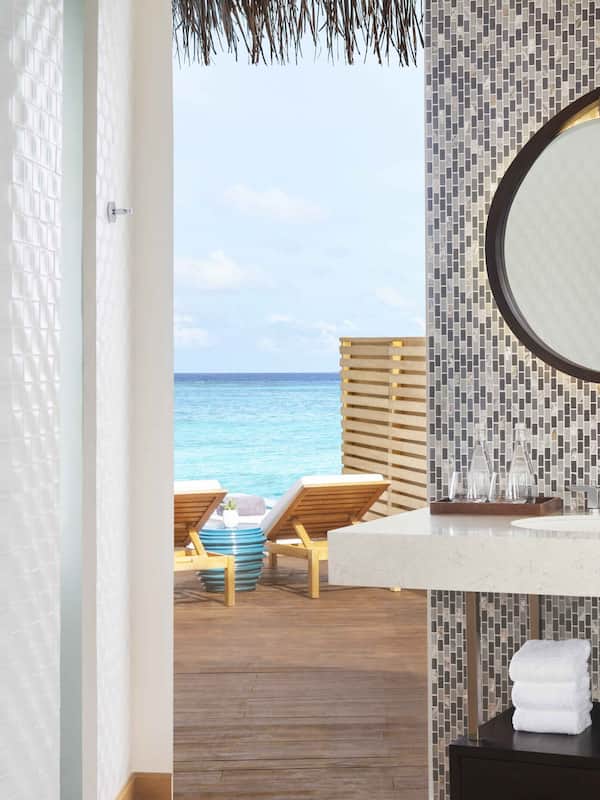 Separate tub and shower, rainfall showerhead, free toiletries