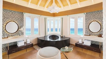 Separate bathtub and shower, rainfall showerhead, free toiletries