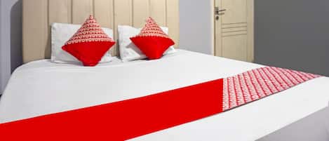 Suite Deluxe | 1 dormitorio, escritorio, wifi gratis y ropa de cama