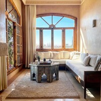 Deluxe Suite (Moroccan Suite) | Living area | Books, printers