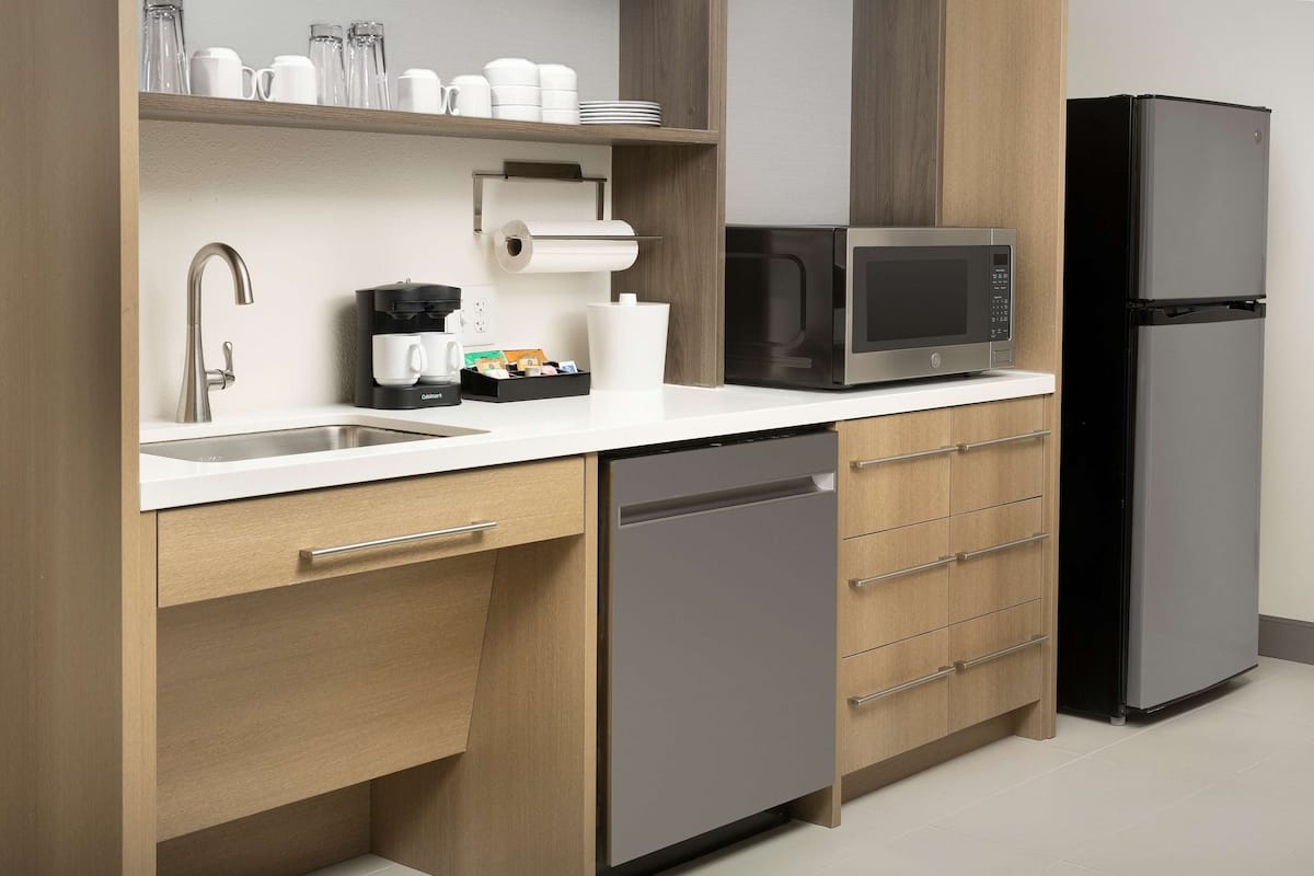 full-sized fridge, microwave, dishwasher, coffee/tea maker