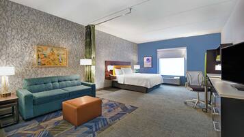 Desk, laptop workspace, blackout drapes, iron/ironing board