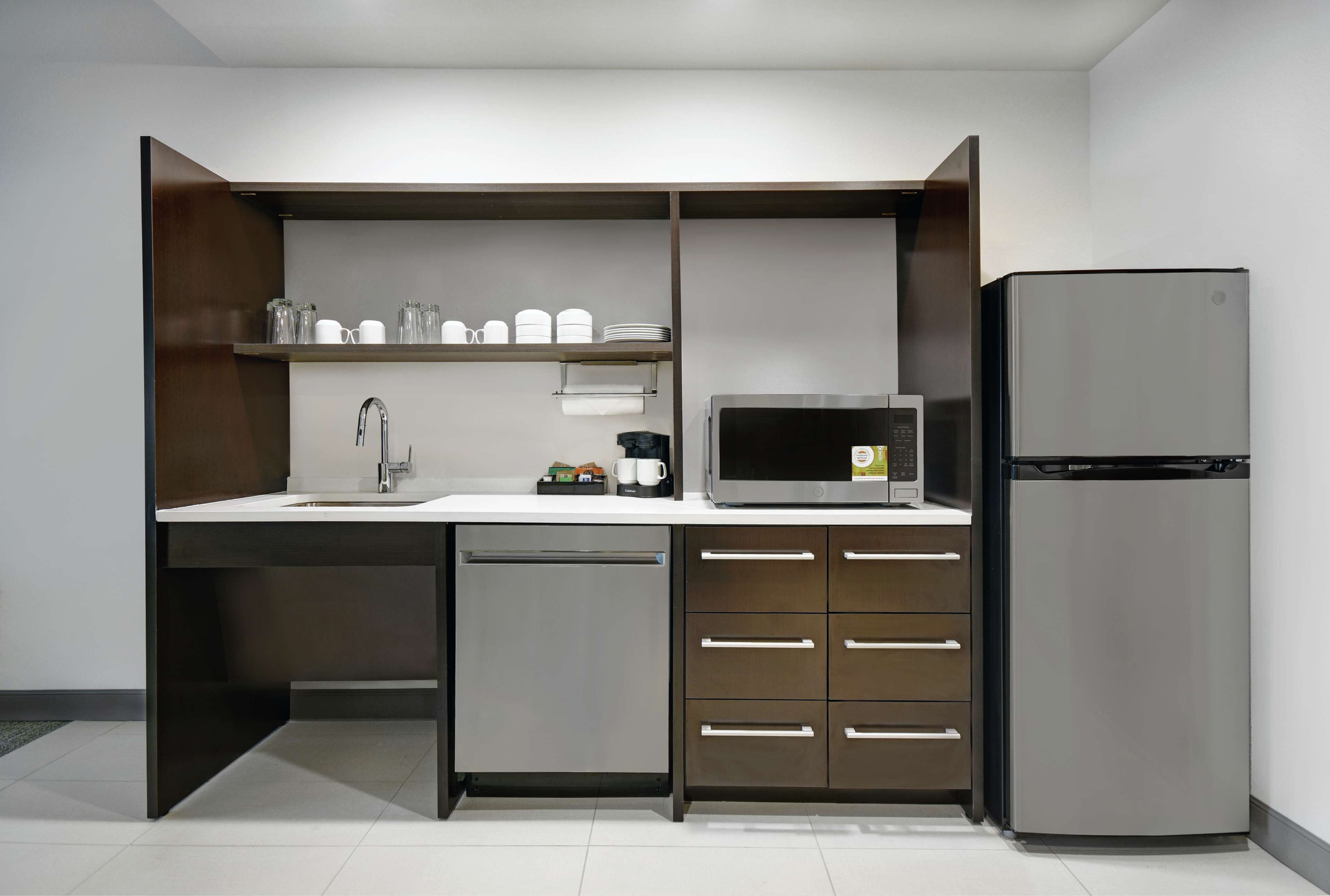 full-sized fridge, microwave, dishwasher, coffee/tea maker