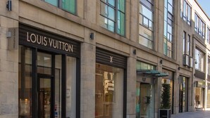 A Louis Vuitton store with large glass windows and a black storefront. - A fusion of Georgian and Modern. Impeccably furnished with excellent attention to detail! (Edinburgh)