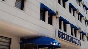A building with a sign reading "SARAL APART" and a blue awning. - Saral Apart (Atakum)
