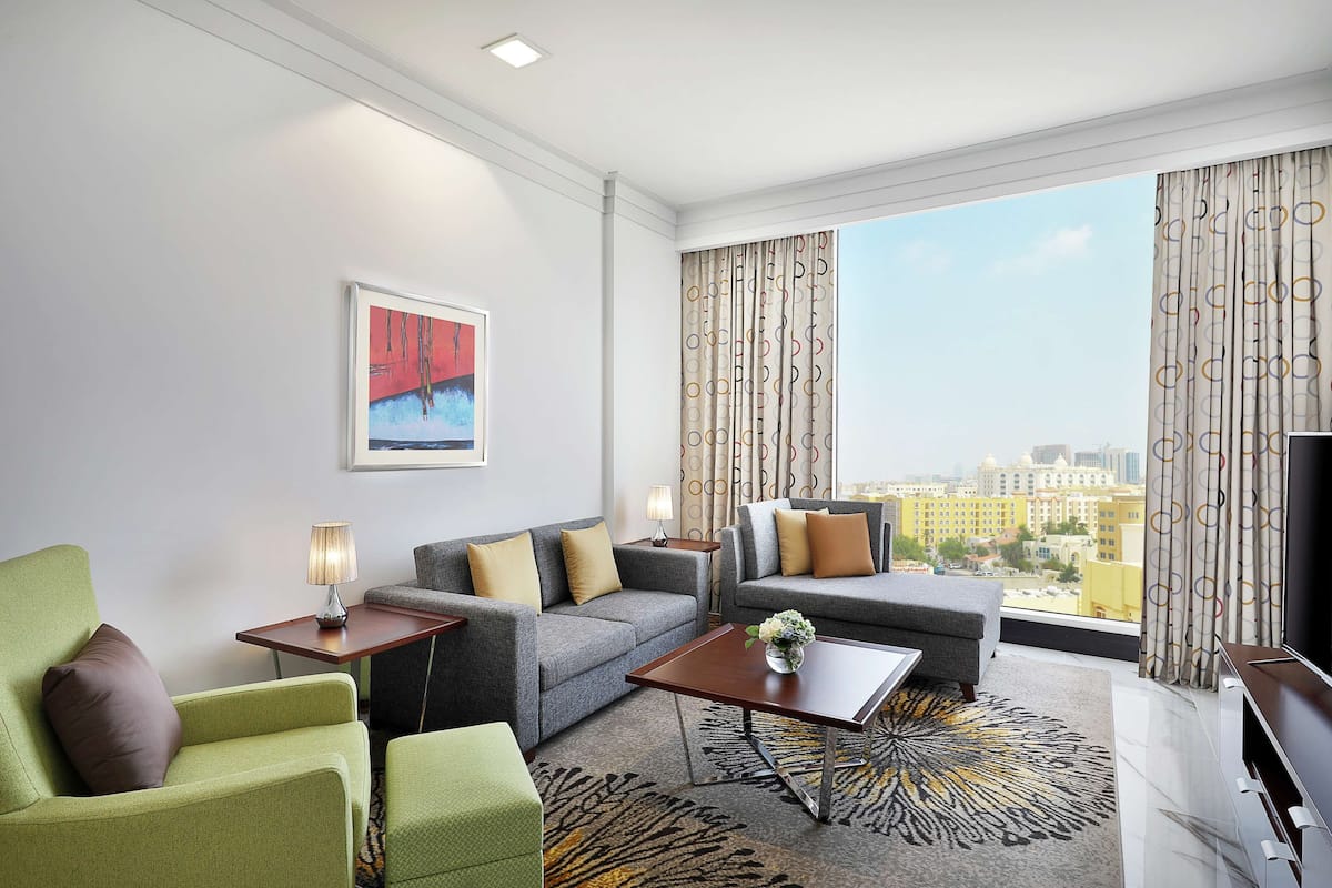 Deluxe Room, 1 Bedroom | 1 bedroom, minibar, in-room safe, individually furnished