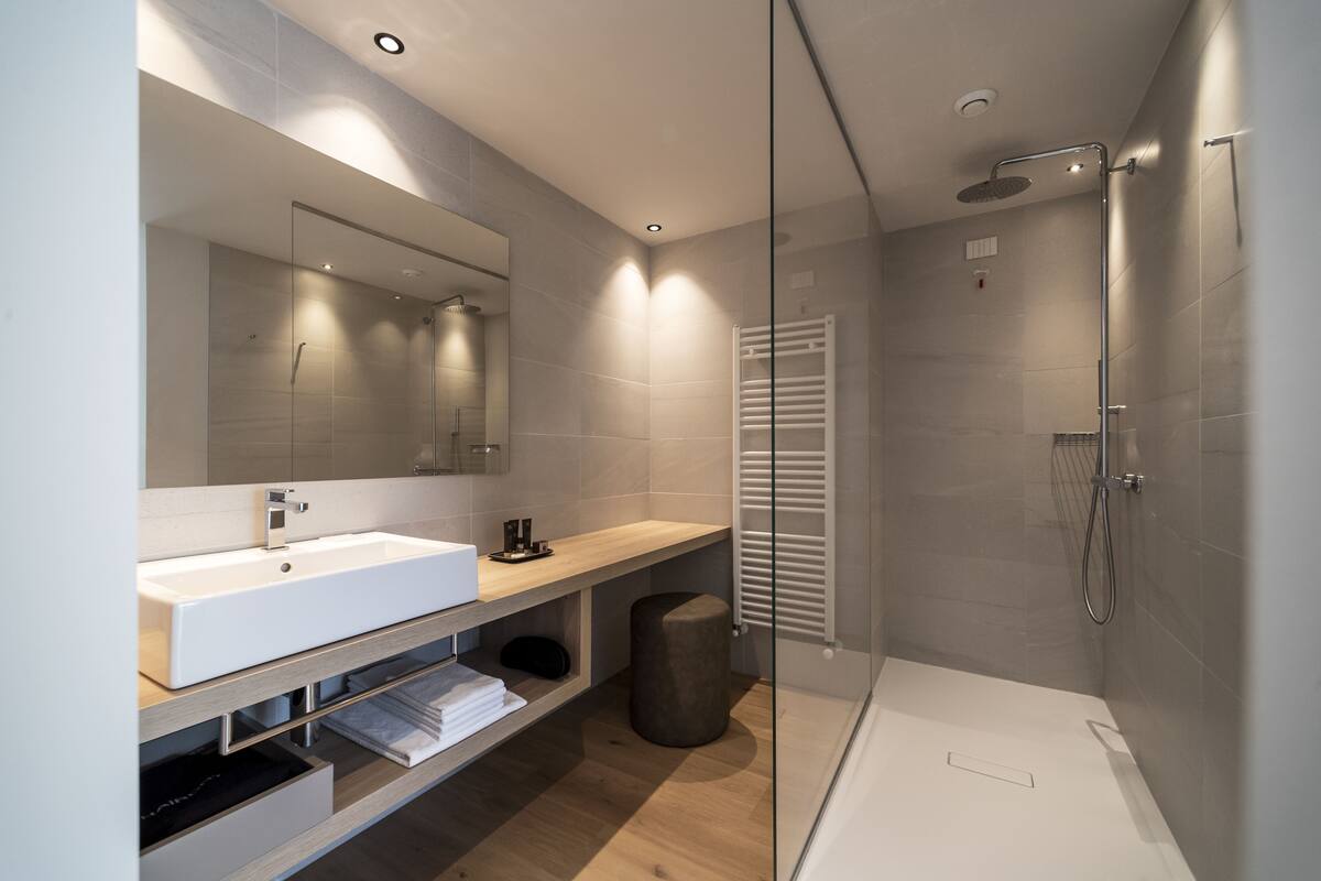 superior room | bathroom | shower, rainfall showerhead, free toiletries, hair dryer