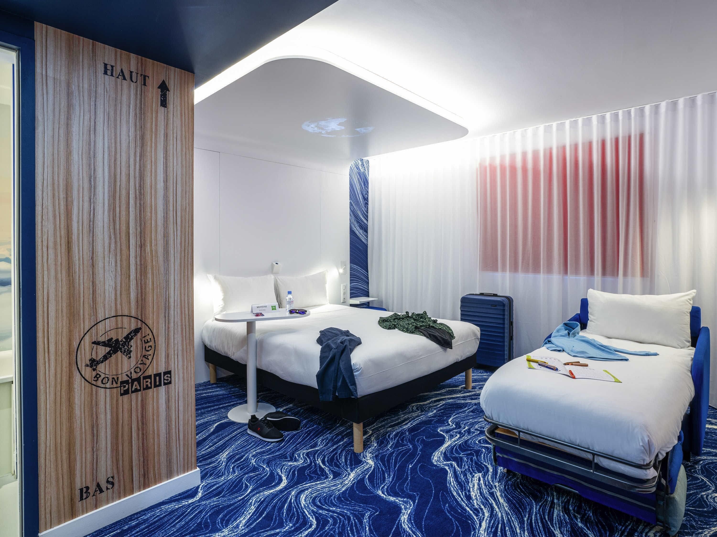 Standard Room, Multiple Beds | Individually furnished, desk, laptop workspace, soundproofing