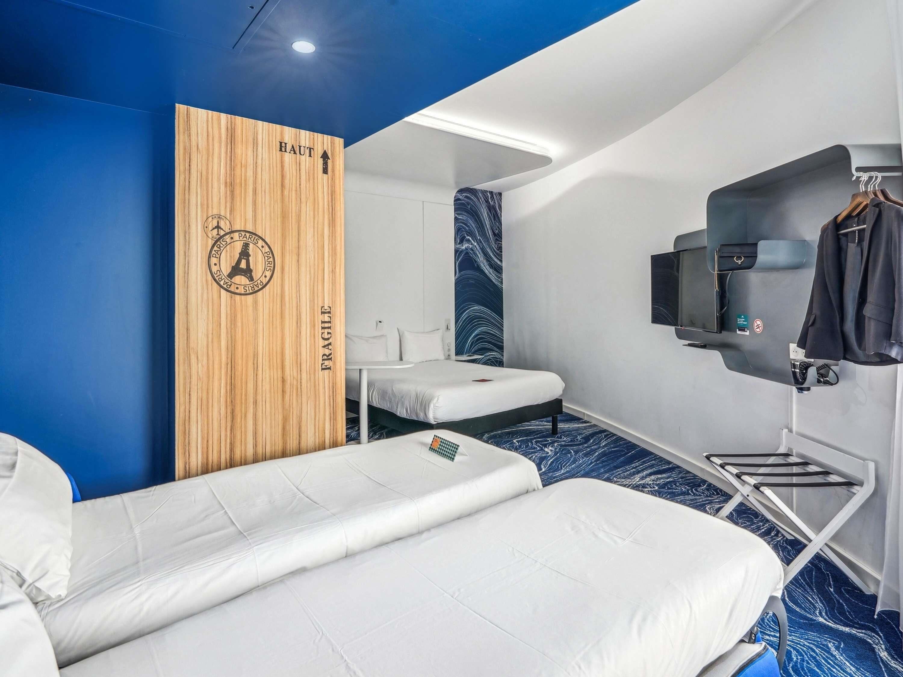 family room, multiple beds | individually furnished, desk, laptop workspace, soundproofing