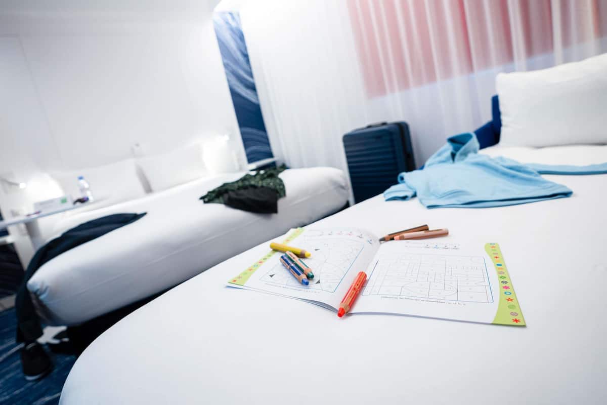 Standard Room, Multiple Beds | Individually furnished, desk, laptop workspace, soundproofing