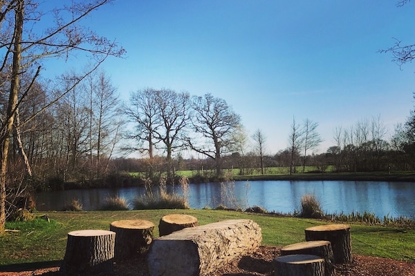 Picnic seats next to the fishing lakes