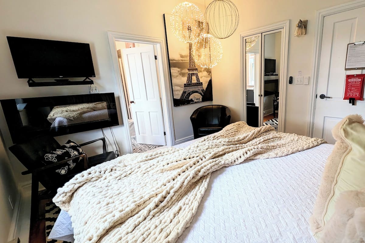 Paris Nights Champagne Suite - King Bedroom | Premium bedding, memory-foam beds, iron/ironing board, free WiFi