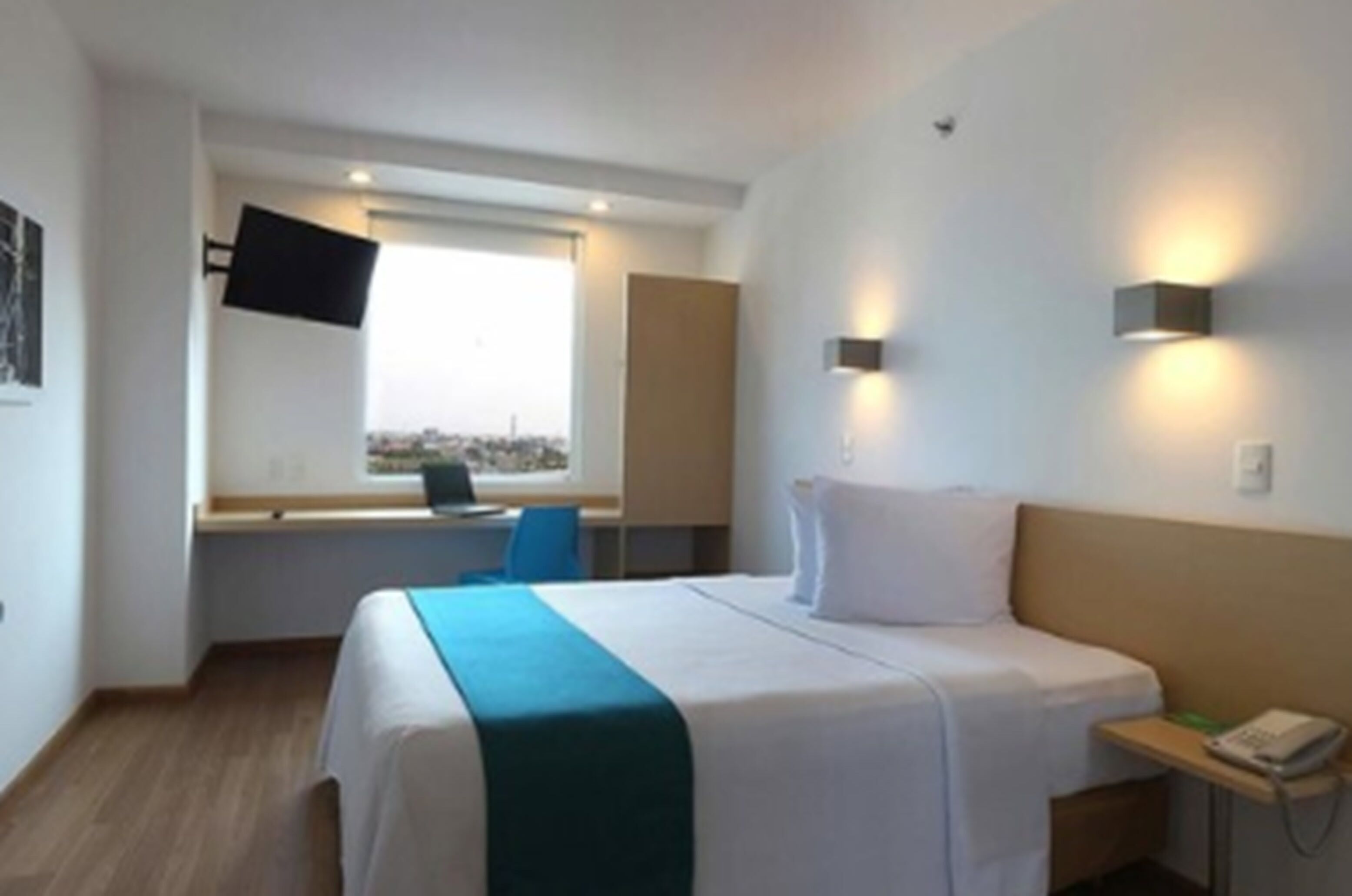 standard double room | in-room safe, desk, laptop workspace, blackout curtains