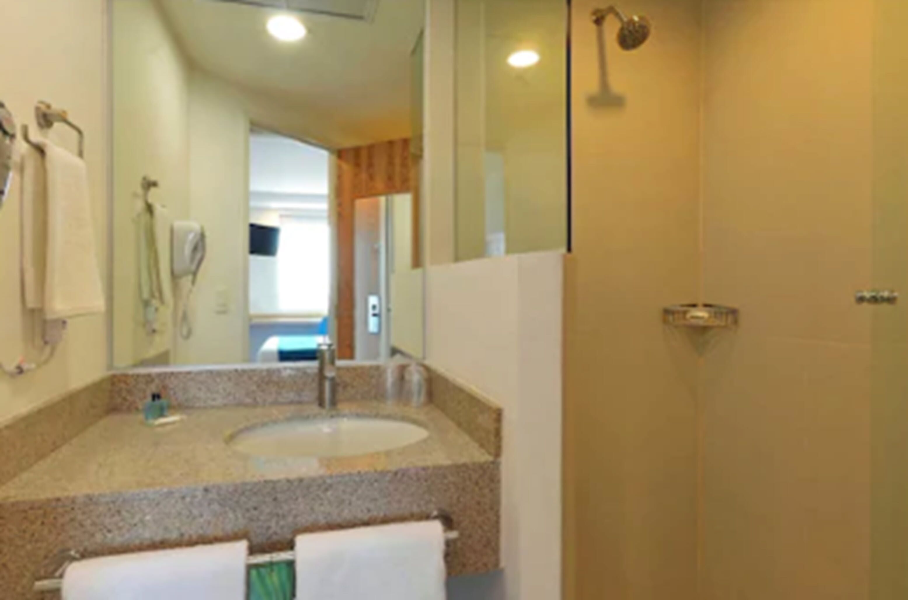 shower, rainfall showerhead, hair dryer, towels