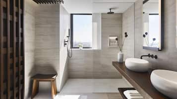 A modern bathroom with a large window, a shower, a vanity with a sink, and a small stool.