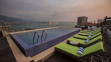 Seasonal outdoor pool, a rooftop pool