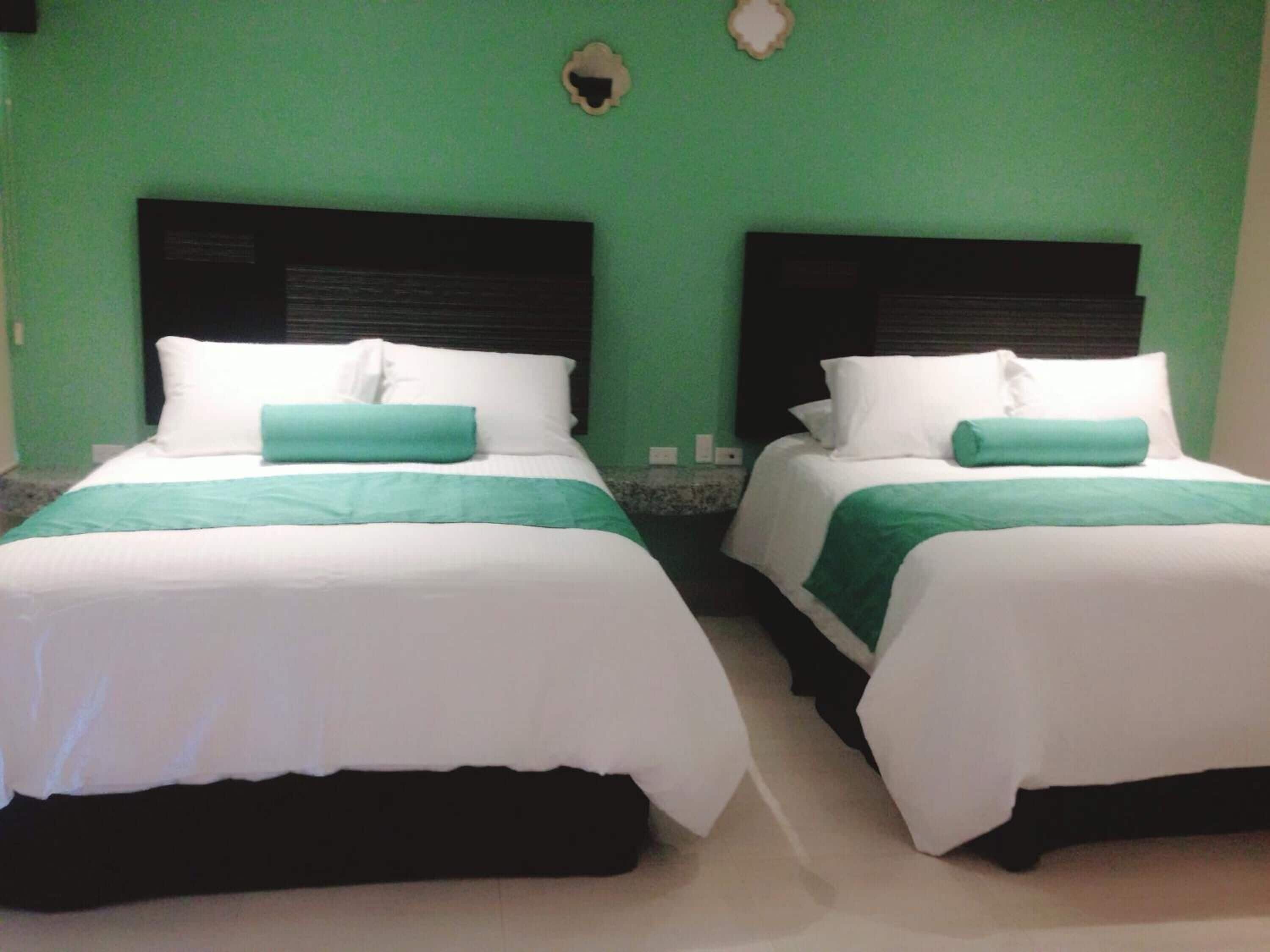 standard double room, 2 queen beds | 1 bedroom, select comfort beds, iron/ironing board, free wifi
