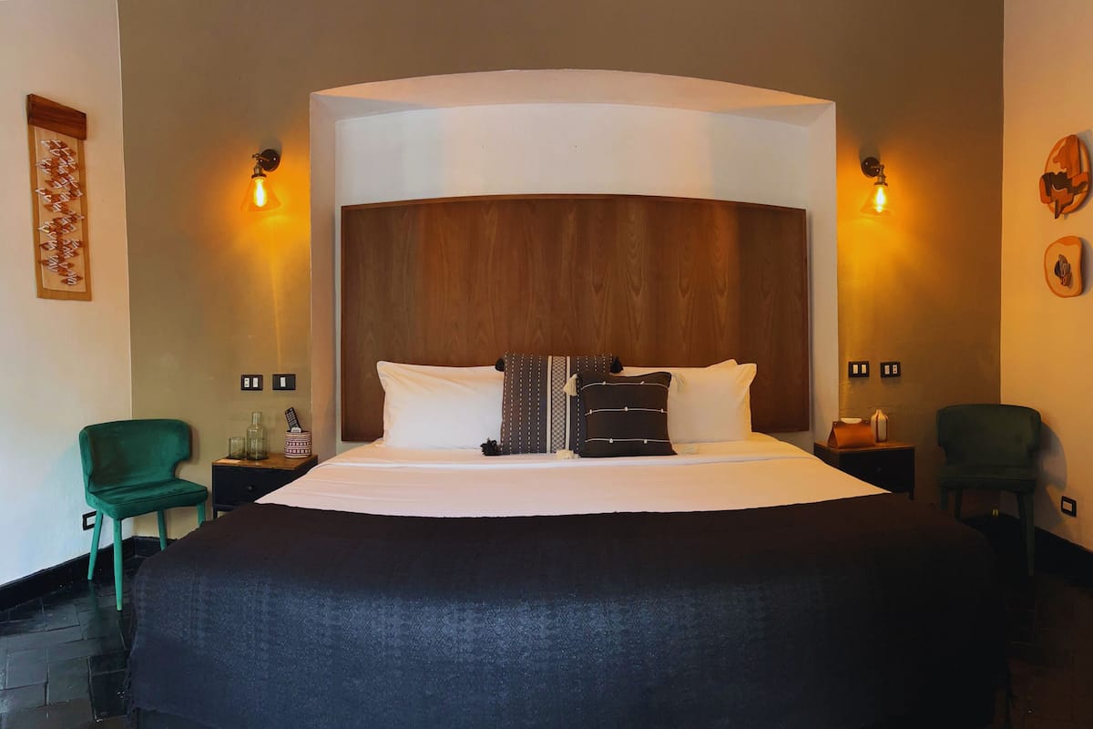 Habitación Premium | Ropa de cama de alta calidad y edredón