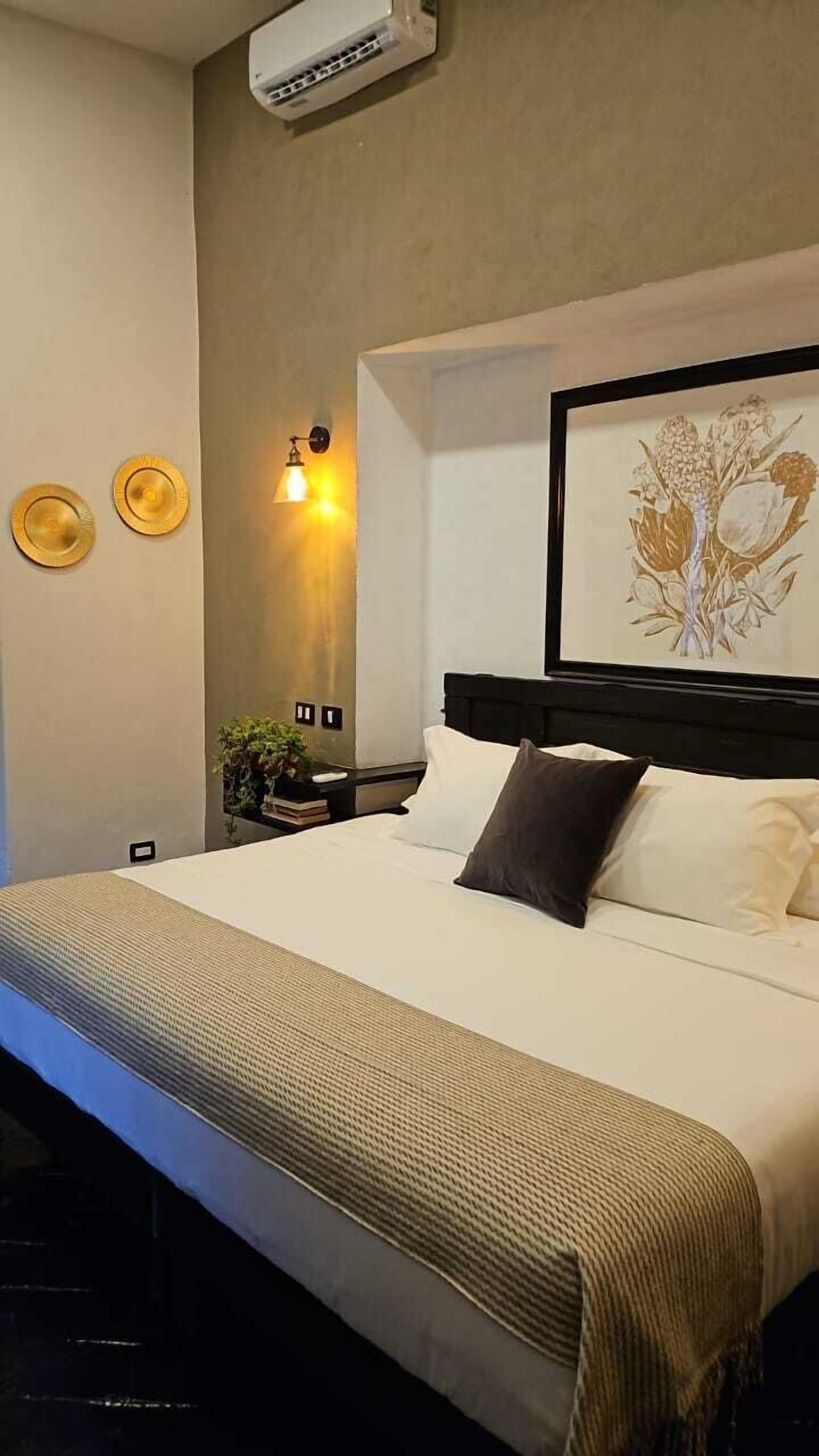 premium bedding, down duvets, in-room safe, individually decorated