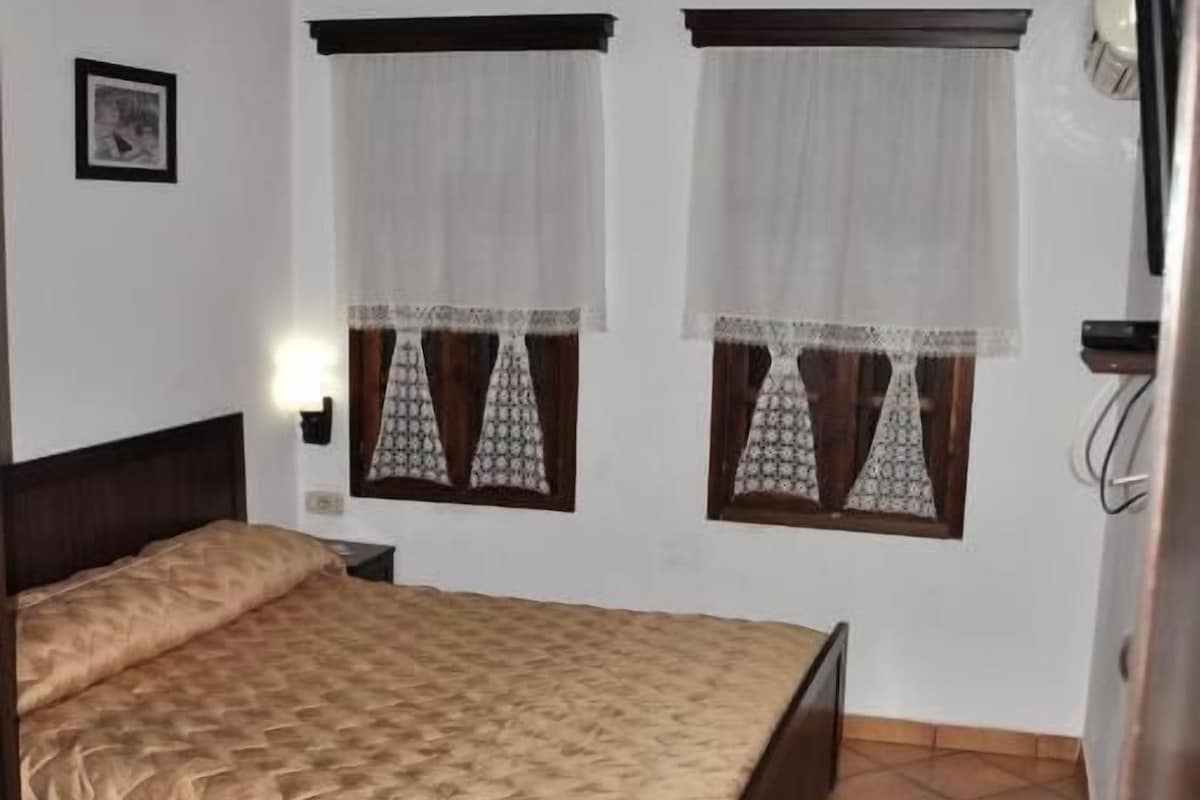 Premium bedding, down comforters, desk, laptop workspace
