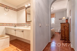 Bathtub, hair dryer, bidet, towels