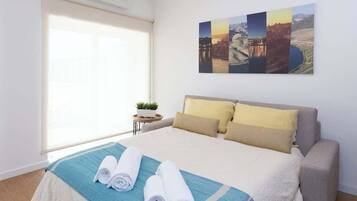 2 dormitorios, tabla de planchar con plancha, cuna de viaje y wifi