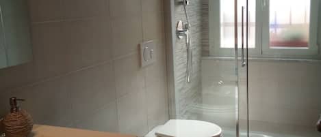Shower, hair dryer, bathrobes, bidet