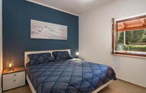 3 多间卧室、旅行婴儿床、免费 WiFi、床单