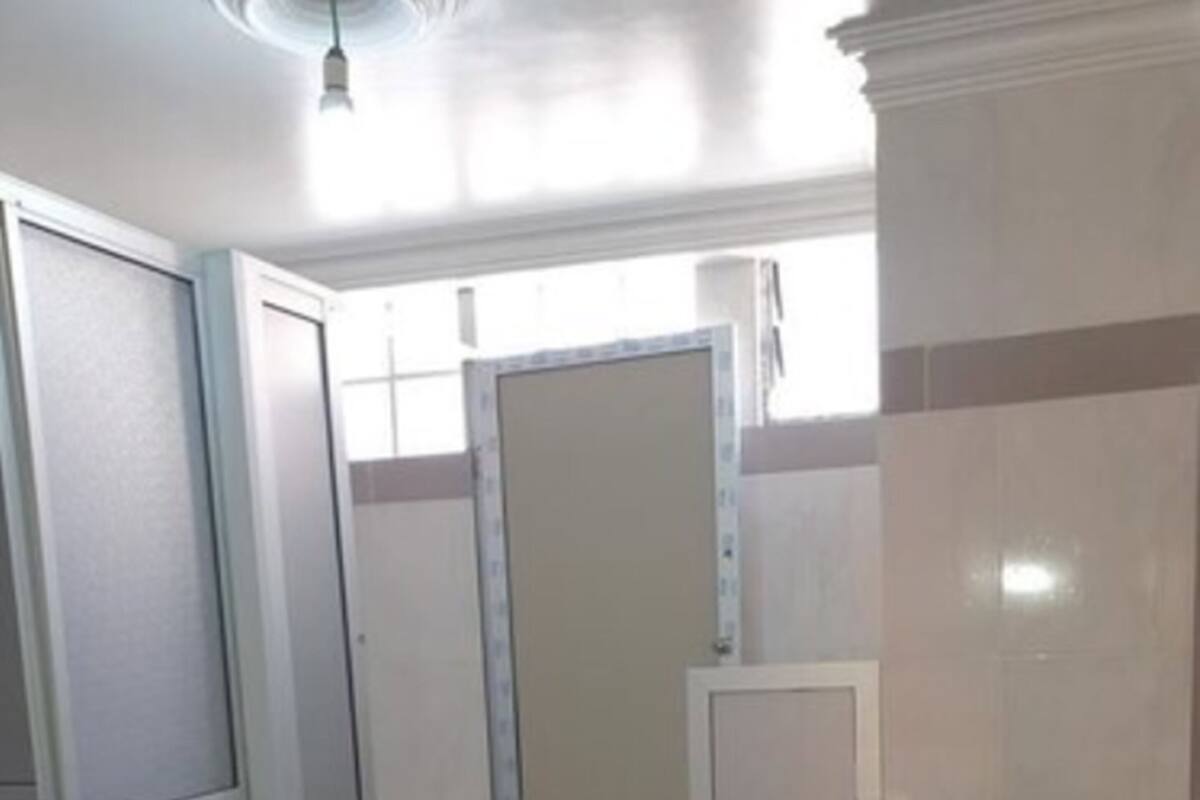 Shower, towels, soap, toilet paper
