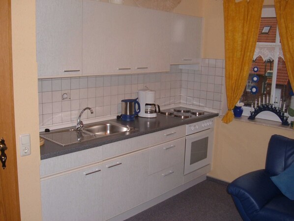 Fridge, oven, high chair